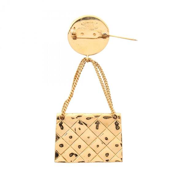 CHANEL Gold Logo Brooch